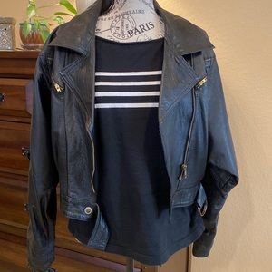 Black Italian leather jacket fully lined with silky paisley material.